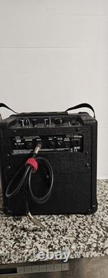 Amplificateur de guitare Vox Da5 avec cordon d'alimentation original testé, fonctionne très bien, nécessite des piles.